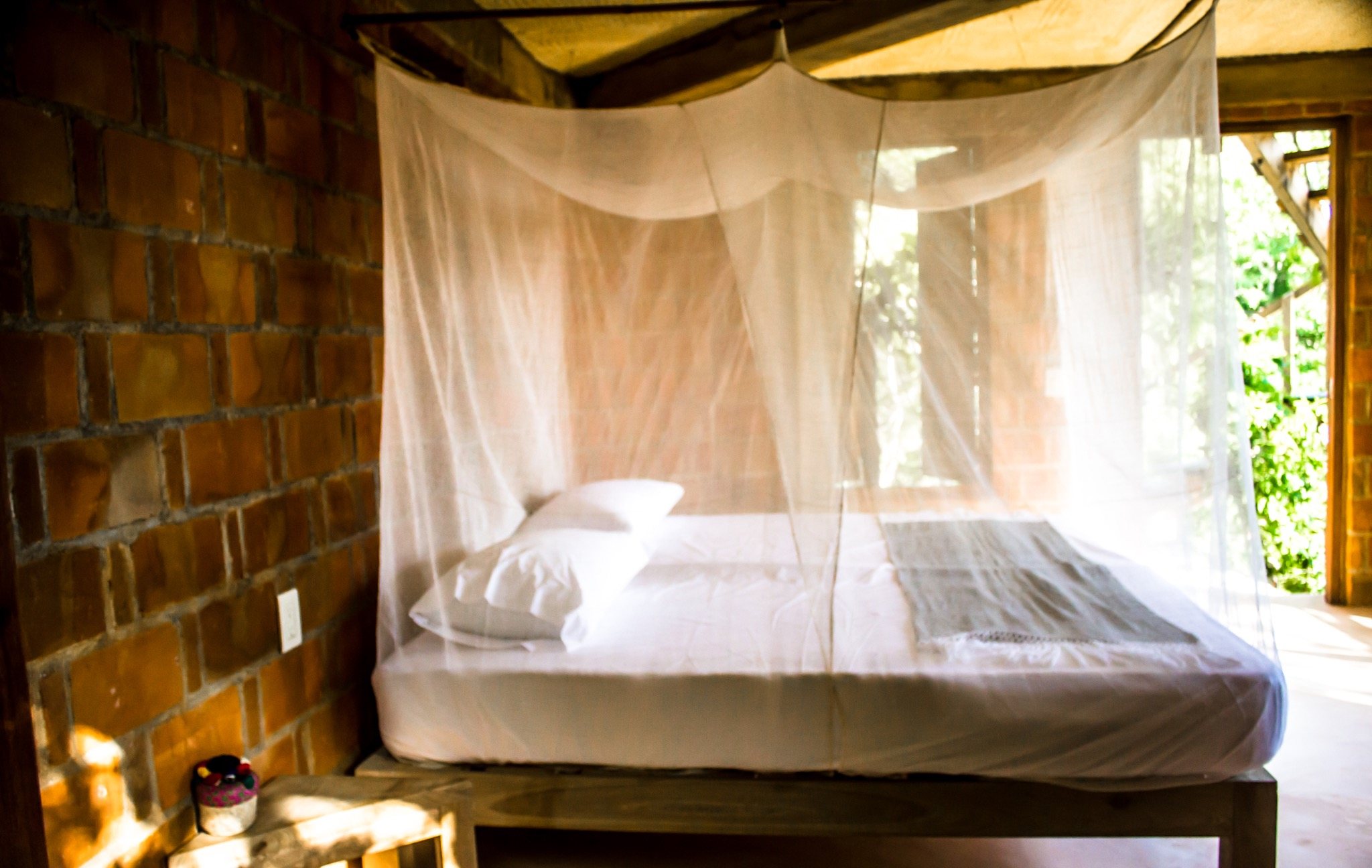 Habitación Nuuna con cama y mosquitero